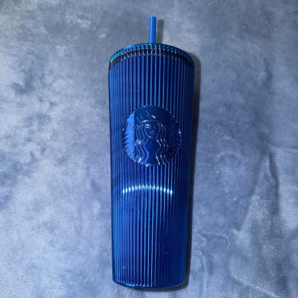 Blue Starbucks tumbler with straw